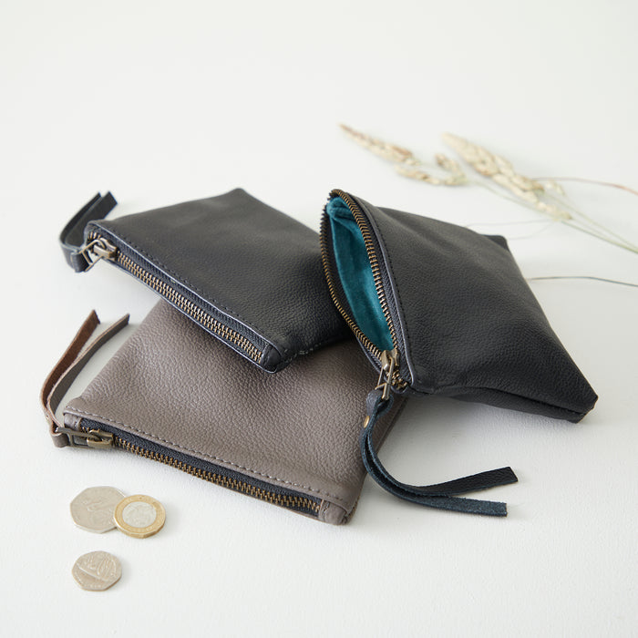 Get a hold of these classic coin purses. Shop the Auria coin purse at